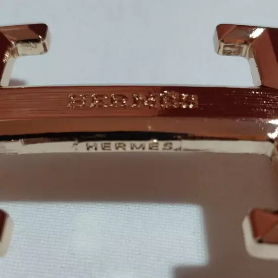 HERMES. Belt buckle with "HERMES" inscription. Gold-tone. 