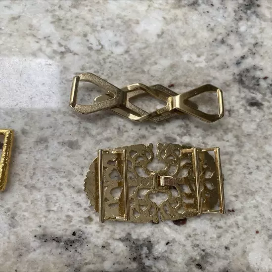 Assorted Gold Tone Interlocking Womens Belt Buckles Two-piece Lot of 9