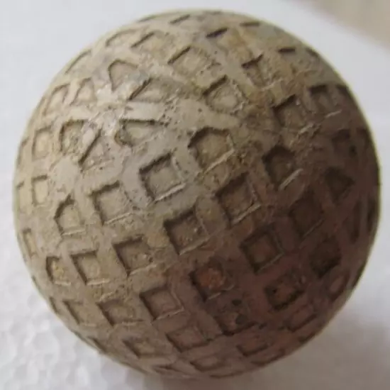 VINTAGE CLAN-MAC MESH GOLF BALL WITH UNUSUAL COVER PATTERN