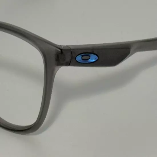 OAKLEY TRILLBE X FRAMES - GRAY SMOKE TRANSLUCENT WITH BLUE ICONS EYEGLASSES