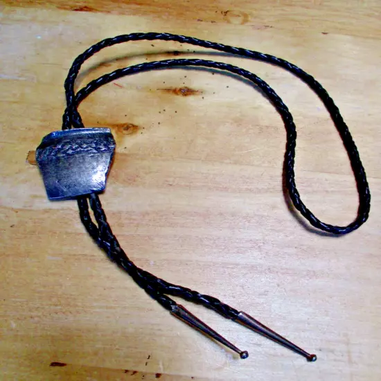 Vintage Native American Sterling tufa cast Bolo Tie with cord