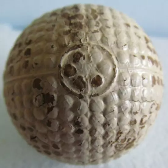 WHITE COLONEL BRAMBLE GOLF BALL WITH CIRCLES AT ALL 6 POLES AND LINES CONNECTING