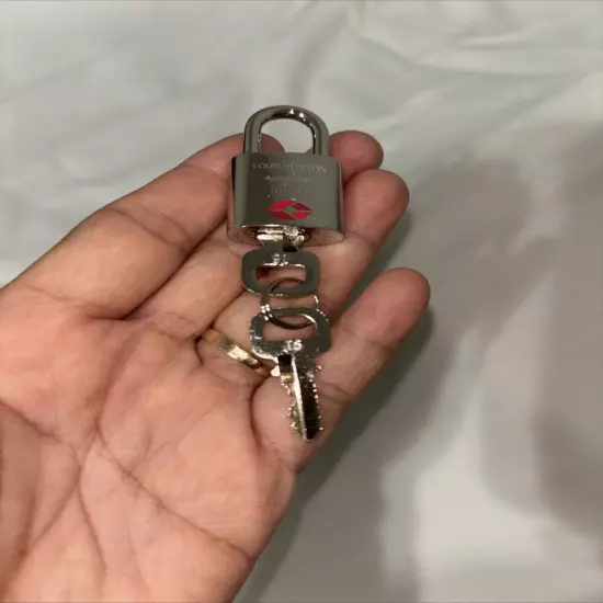 NEW Silver toned Louis Vuitton Lock 