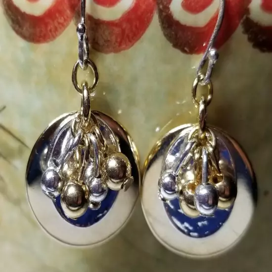 Silvertone and Goldtone Earrings with Dangling Balls. 