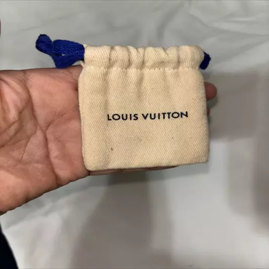 NEW Silver toned Louis Vuitton Lock 