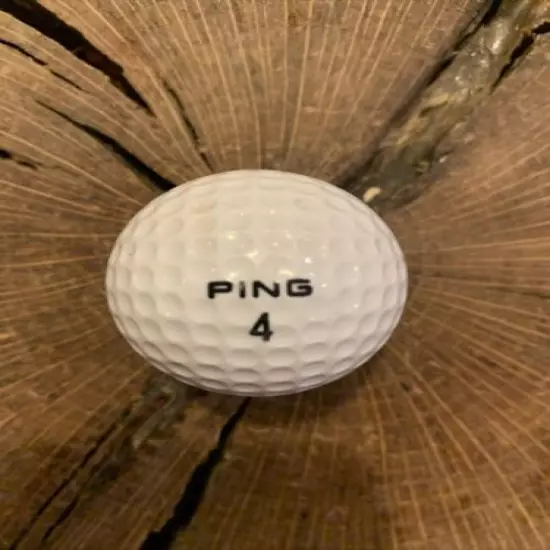 VINTAGE AQUA AND WHITE PING EYE GOLF BALL