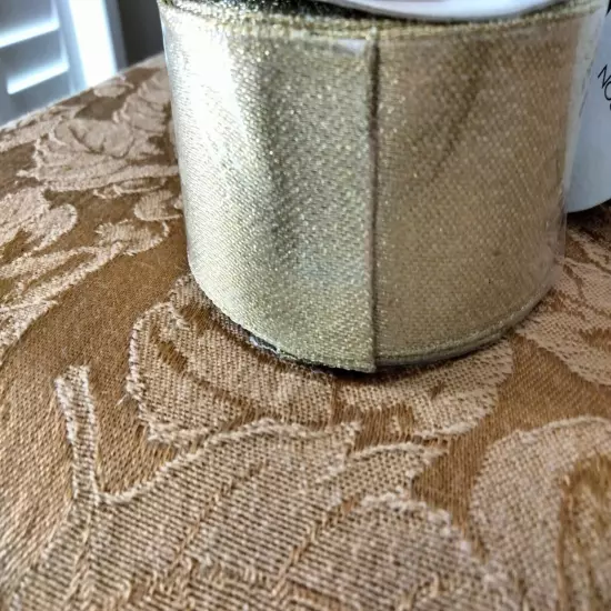  2 ROLLS OF CASPARI GOLD METALLIC RIBBON & ONE SMALL ROLL.