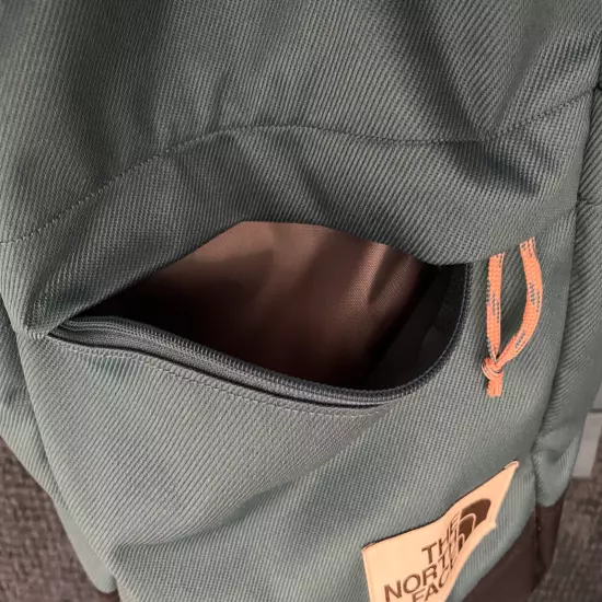 Brand New Never Used The North Face Teal Backpack w Orange Zippers. Many Pockets