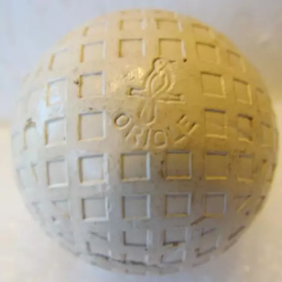 VINTAGE MESH GOLF BALL-THE GOLDSMITH ORIOLE-FEW STRIKE MARKS-ORIOLE ON EACH POLE