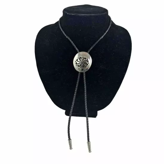 Vtg Pinwheel Bolo Tie Black Cord Silvertone Cut Out