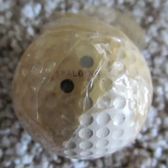 VINTAGE SPALDING TOP-FLITE DOUBLE DOT GOLF BALL WITH PARTIAL CELLOPHANE WRAPPER