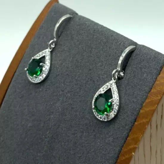 Earrings. Silver Tone Emeral Green Crystal w Clear Crystal Opal Shape Frame.