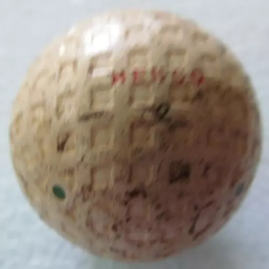 VINTAGE OLD SQUARE MESH GOLF BALL-THE HENCO WITH MULTI-MARKING MADE BY HENLEY