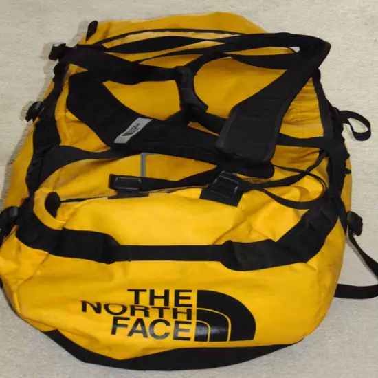 THE NORTH FACE YELLOW/BLACK DUFFEL BAG WITH BACKPACK STRAPS