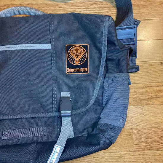 PRE OWNED TIMBUK2 MESSENGER BAG - GRAY W/ ORANGE ACCENTE AND JAGERMEISTER PATCH