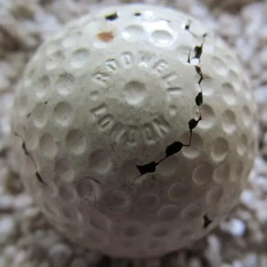 EARLY DIMPLE GOLF BALL-THE CROWN BY RODMAN WITH SEVERAL CRACKS-RARE GOLF BALL