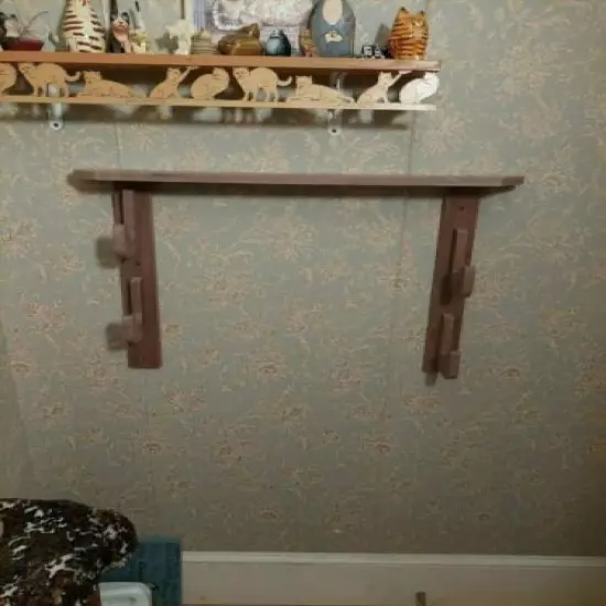 vertical wall mount gun rack...GUNS NOT INCLUDED..hand made walnut rack 