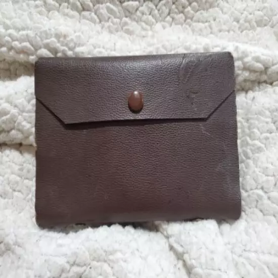 Vintage fly fishing wallet with flies