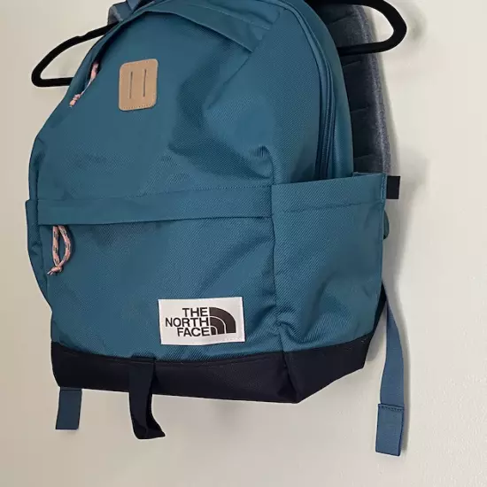 Brand New Never Used The North Face Teal Backpack w Orange Zippers. Many Pockets