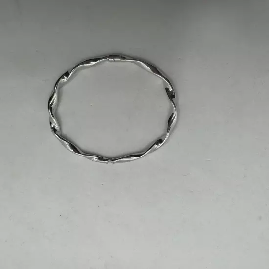 Silver Tone Bracelet With Artist Signature.